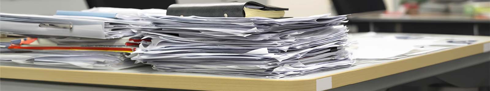 Paper Clutter for onboarding a new hire without a Digital Document Management System
